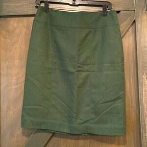Green polka dot print pencil skirt. Size 6.